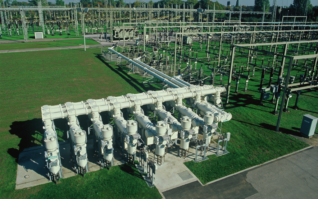 Outdoor gas-insulated switchgear bays — switchgear digitalization keeps breakers, insulation and gas systems continuously monitored (switchgear digitalization brochure photography)